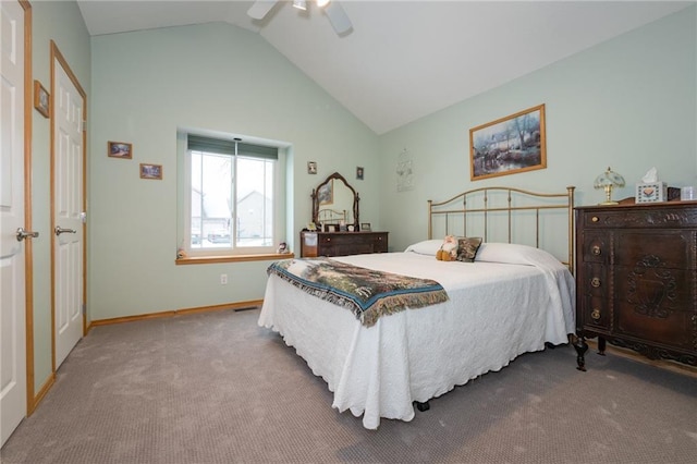 carpeted bedroom with high vaulted ceiling and ceiling fan