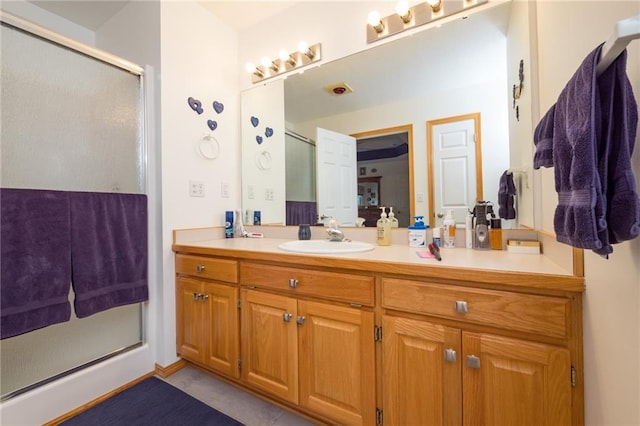 bathroom featuring vanity and walk in shower