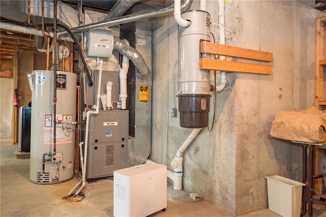 utility room with water heater and heating unit