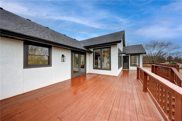 wooden terrace featuring french doors