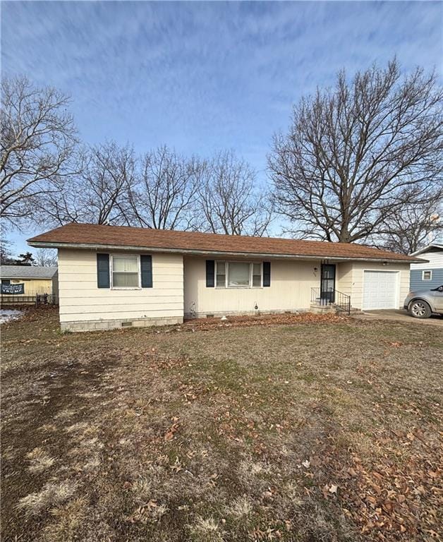 ranch-style house with a garage