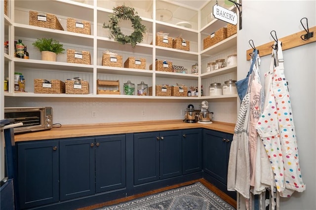 pantry featuring a toaster