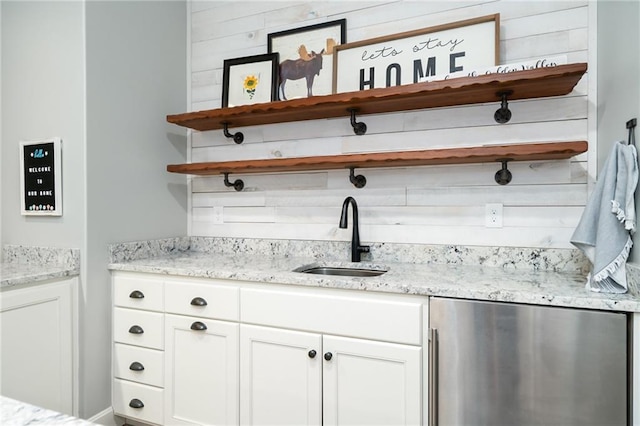 bar with a sink and fridge