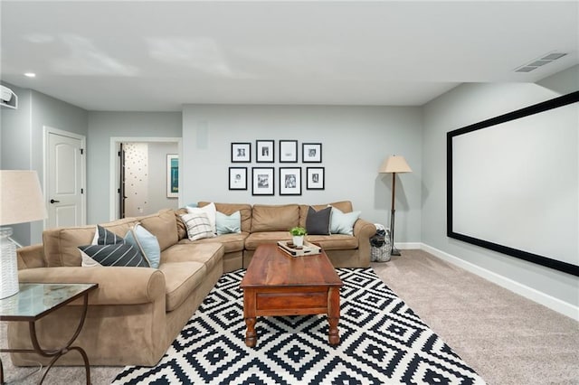 carpeted cinema room featuring visible vents, recessed lighting, and baseboards