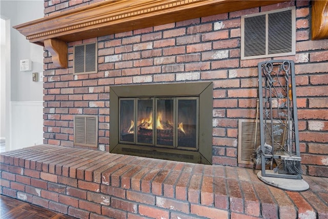 details with a brick fireplace