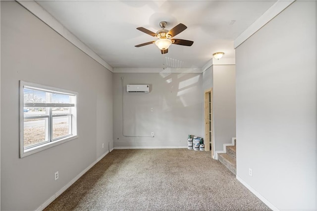 carpeted spare room with ceiling fan, crown molding, and an AC wall unit