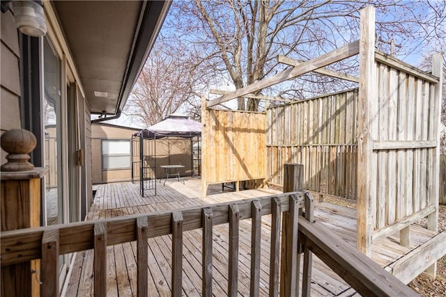 wooden deck with a gazebo