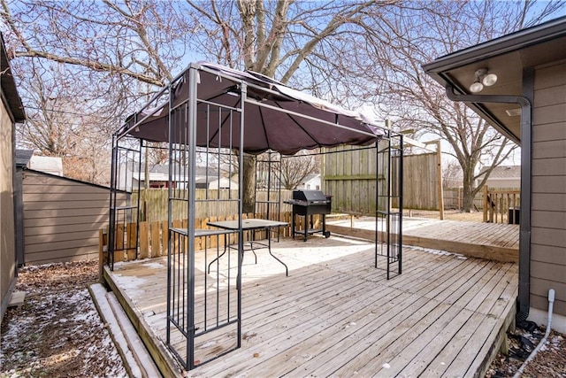 deck featuring area for grilling and a gazebo