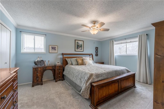 bedroom featuring multiple windows, ornamental molding, and light colored carpet