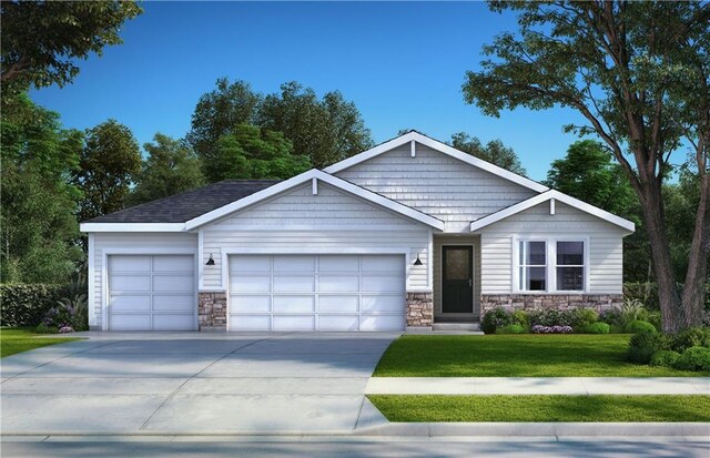 view of front of property with a front yard and a garage