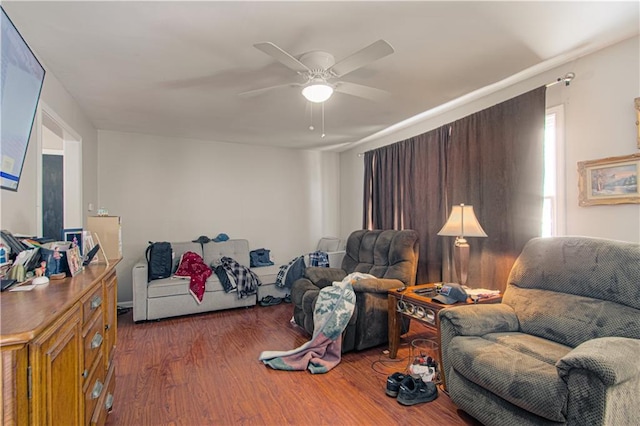 interior space featuring dark wood-style floors and ceiling fan