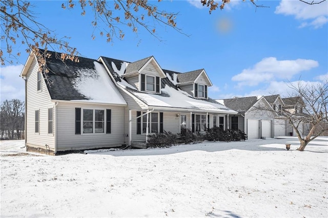 cape cod-style house with a shingled roof