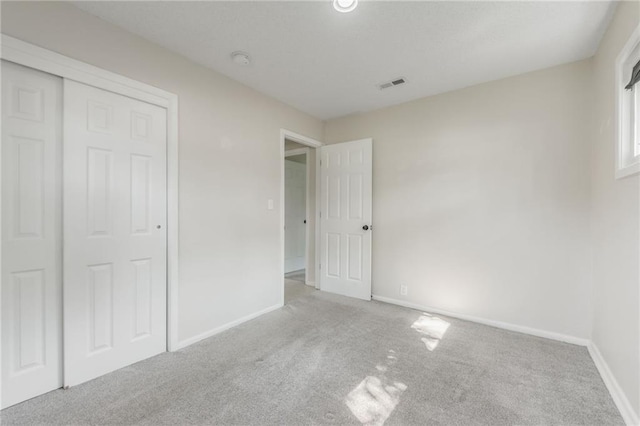 11413 Palmer Ave, Kansas City, MO 64134 - unfurnished bedroom featuring carpet and a closet