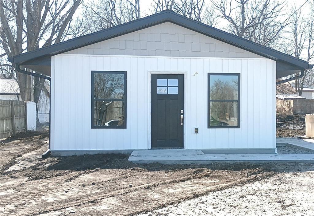 view of front of home with fence