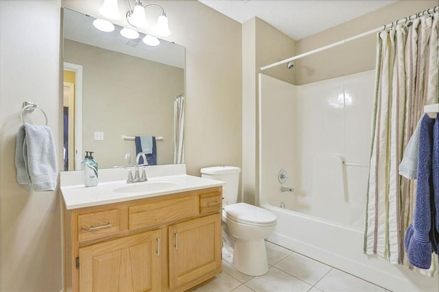 full bath with toilet, shower / tub combo with curtain, tile patterned floors, an inviting chandelier, and vanity