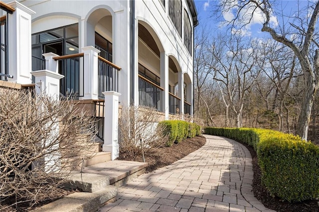 view of property exterior with stairway