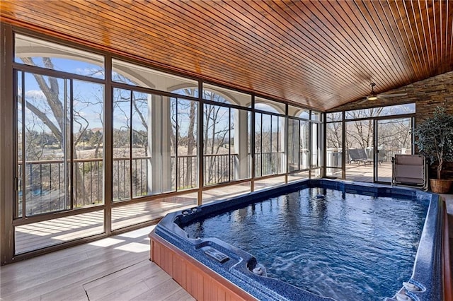 view of pool with a swimming pool and an indoor hot tub