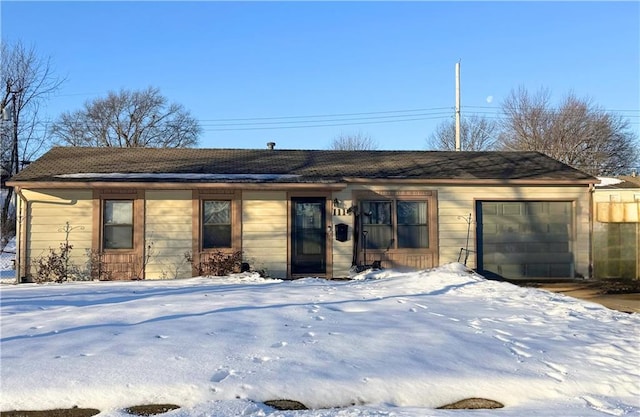 single story home with an attached garage