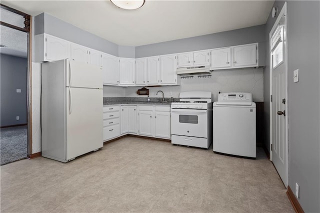 kitchen with white appliances, washer / dryer, white cabinets, light floors, and under cabinet range hood