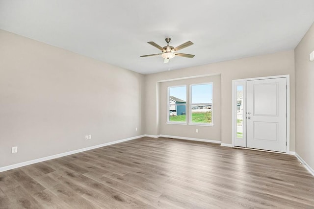 interior space featuring hardwood / wood-style flooring and ceiling fan