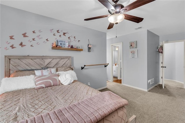 carpeted bedroom featuring baseboards, visible vents, and a ceiling fan