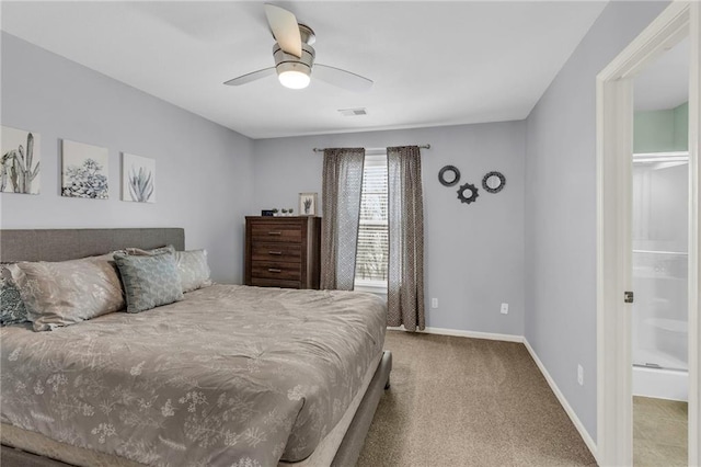 carpeted bedroom featuring visible vents, baseboards, and a ceiling fan