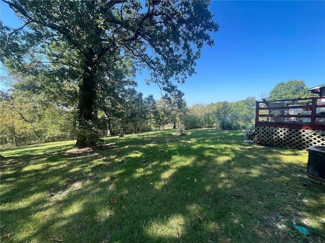 view of yard with a deck