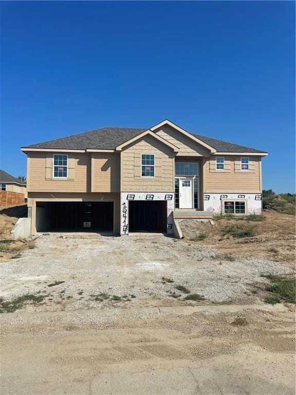 view of front of property with a garage