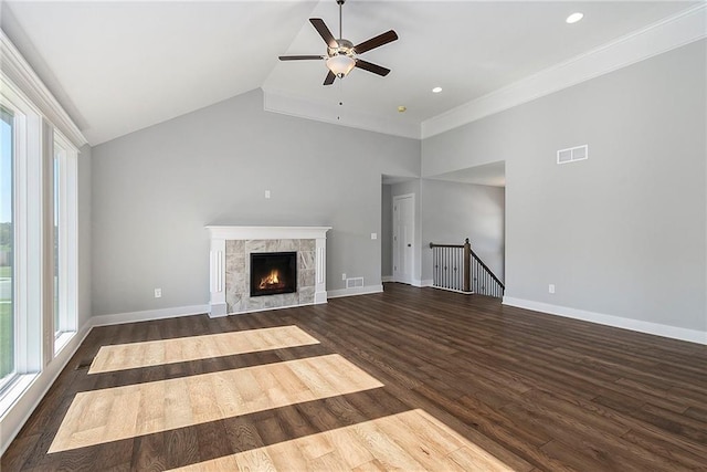 12414 Adam St, Excelsior Springs, MO 64024 - unfurnished living room featuring dark wood-style flooring, a ceiling fan, high vaulted ceiling, baseboards, and recessed lighting