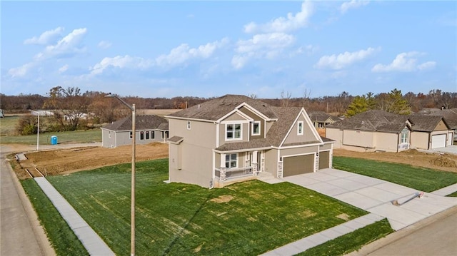 view of front facade featuring a garage and a front lawn