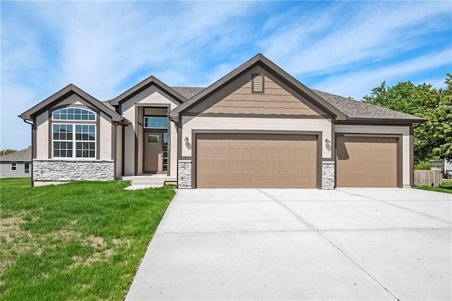 12415 Morgan St, Excelsior Springs, MO 64024 - view of front facade featuring an attached garage, stone siding, concrete driveway, and a front lawn
