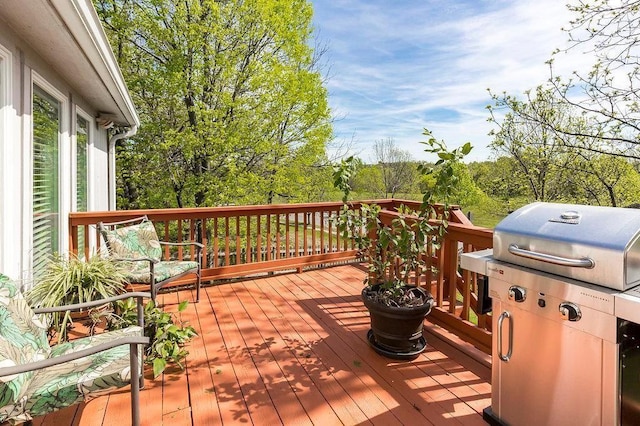 wooden deck with area for grilling