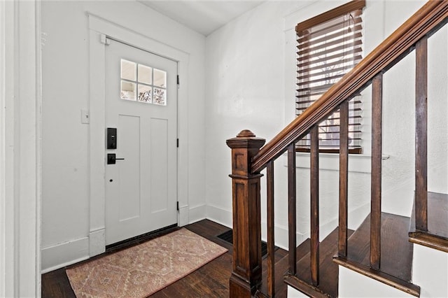 entrance foyer featuring dark wood-type flooring