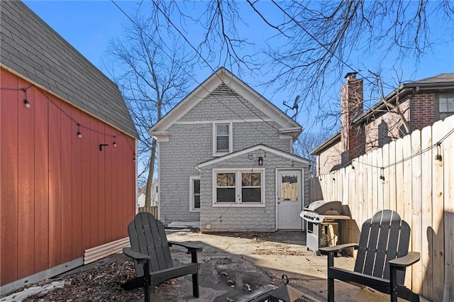 back of house featuring a patio