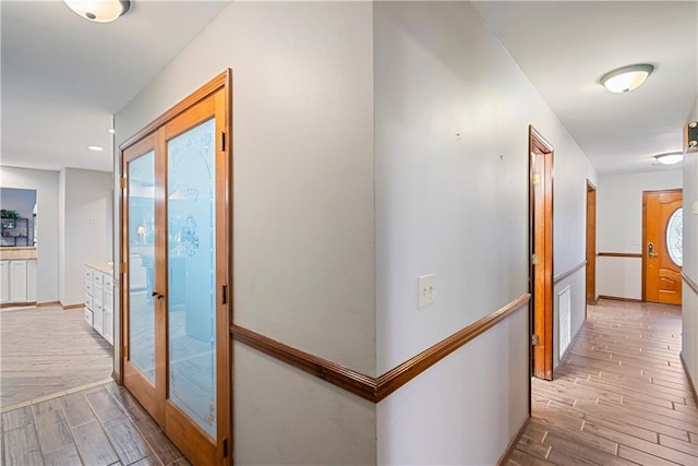 hallway featuring wood finish floors