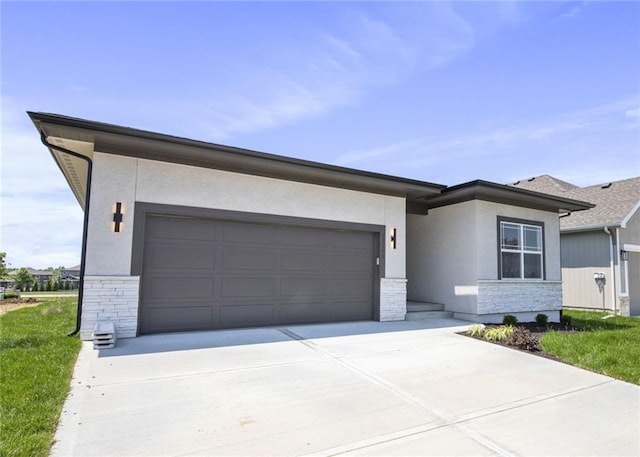 17151 W 168th Pl, Olathe, KS 66062 - view of front facade featuring stone siding, concrete driveway, stucco siding, and a garage