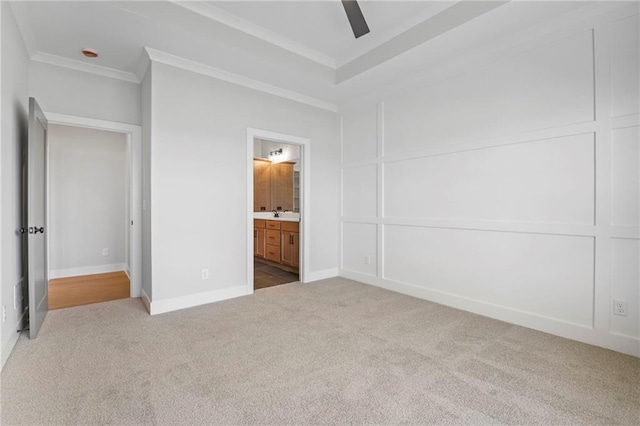 17151 W 168th Pl, Olathe, KS 66062 - unfurnished bedroom featuring carpet, ornamental molding, a decorative wall, connected bathroom, and ceiling fan
