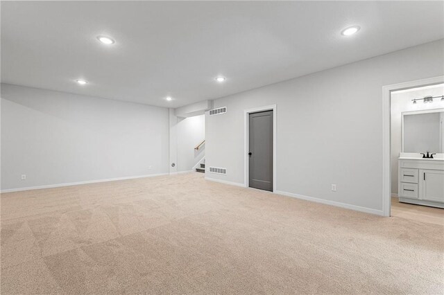 17151 W 168th Pl, Olathe, KS 66062 - empty room with recessed lighting, light colored carpet, and stairway