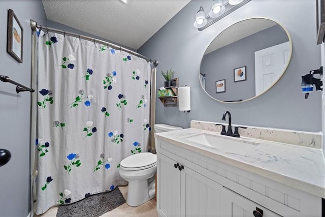 bathroom with a textured ceiling, toilet, tile patterned floors, vanity, and a shower with curtain