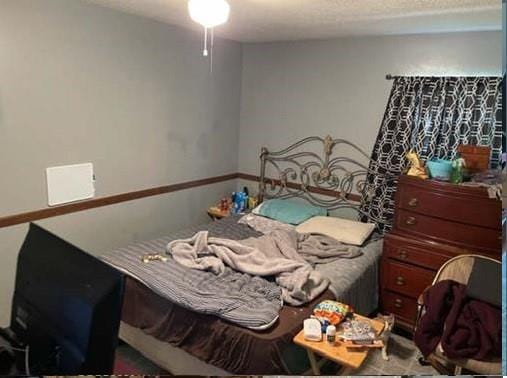 bedroom with a textured ceiling