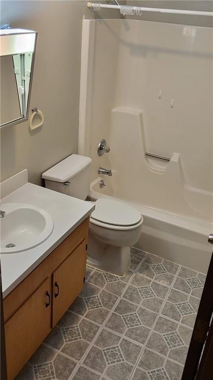 full bathroom featuring vanity, tub / shower combination, tile patterned flooring, and toilet