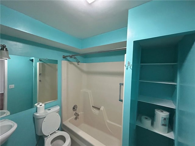 full bathroom featuring shower / bathing tub combination, toilet, and sink