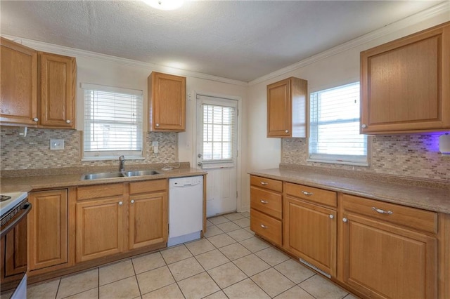 kitchen with light tile patterned floors, white appliances, a sink, ornamental molding, and decorative backsplash