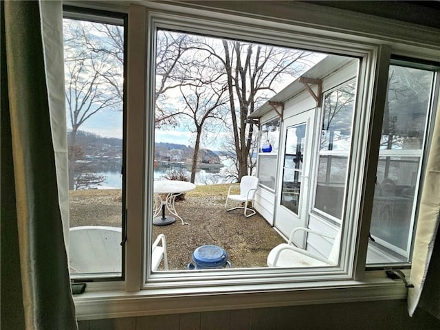 doorway featuring a water view