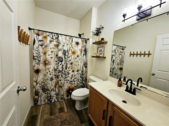 full bath with a shower with shower curtain, vanity, toilet, and wood finished floors