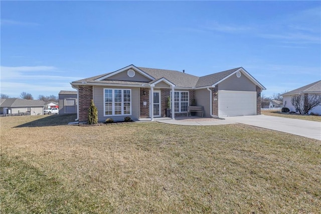 ranch-style house featuring driveway, brick siding, an attached garage, and a front yard