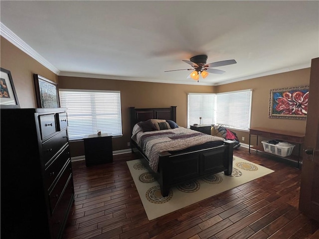 bedroom with baseboards, dark wood finished floors, and crown molding