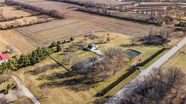 birds eye view of property featuring a rural view