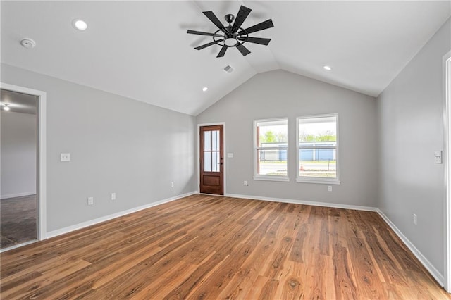 607 W Dryden St, Odessa, MO 64076 - unfurnished living room with visible vents, baseboards, ceiling fan, wood finished floors, and lofted ceiling