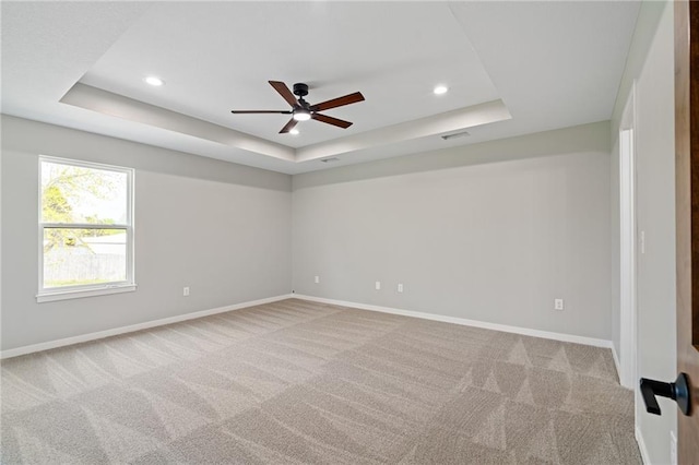 607 W Dryden St, Odessa, MO 64076 - empty room featuring baseboards, recessed lighting, carpet flooring, a raised ceiling, and ceiling fan